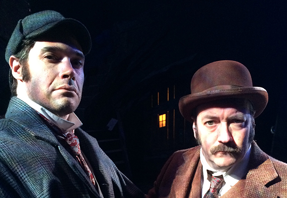 Matthew Greer as Sherlock Holmes and Liam Craig as Dr. Watson